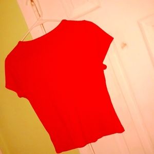 Size is medioum color is like red orange